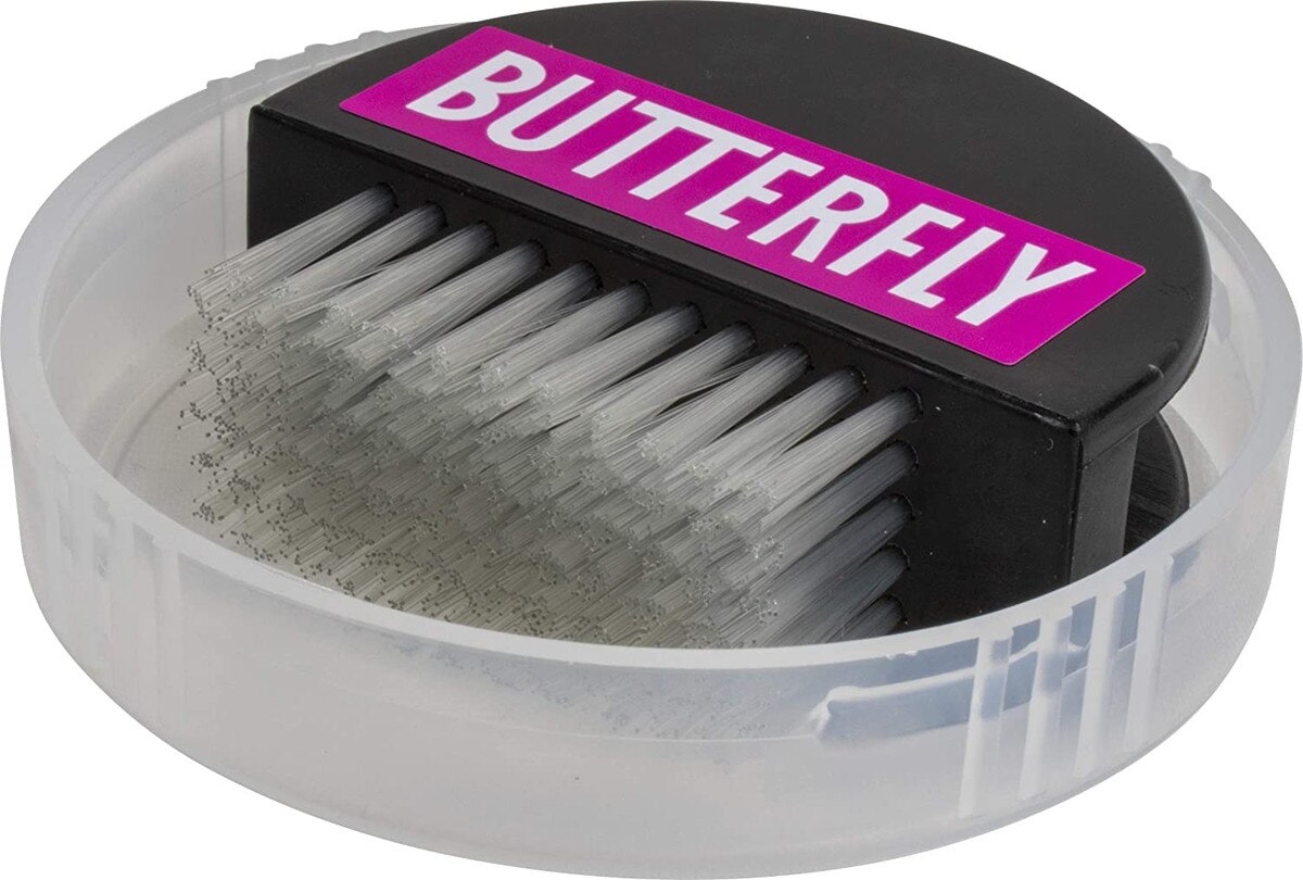 Butterfly Clean Brush: Close-up of the front of the Brush in Container